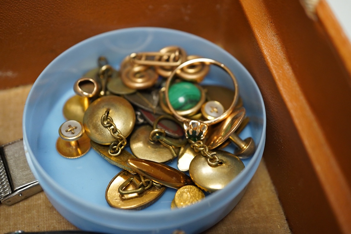 A quantity of assorted antique and later costume jewellery to include a silver and Marcasite ladies fob watch, a collection of cufflinks, brooches and a pair of drop earrings with screw backs